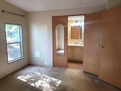 THIS HOME IS ON LEASED LAND WITH A MONTHLY LOT RENT OF $632 AND - photo 31