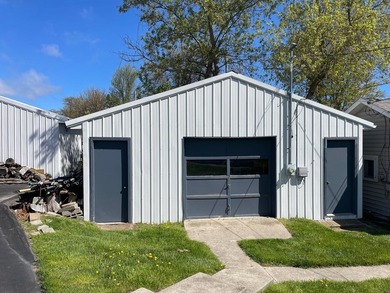 Nestled on the picturesque west shore of Houghton Lake, the - photo 20