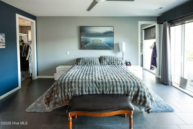Welcome to this custom lakefront home on Lake Auman, where the - photo 24