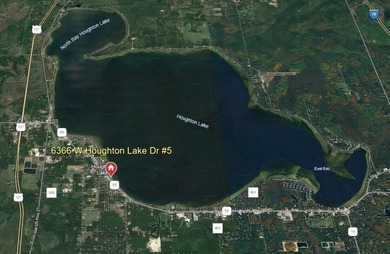 Nestled on the picturesque west shore of Houghton Lake, the - photo 27