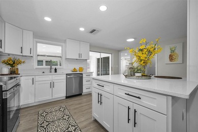 Welcome to this beautifully updated 3-bedroom, 2-bathroom home - photo 8