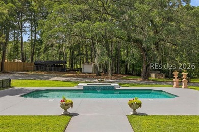 Tucked behind wrought iron gates on over four private, fenced - photo 45