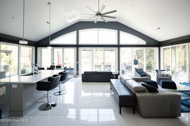 Welcome to this custom lakefront home on Lake Auman, where the - photo 47