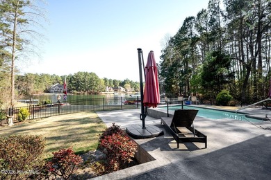 Welcome to this custom lakefront home on Lake Auman, where the - photo 48