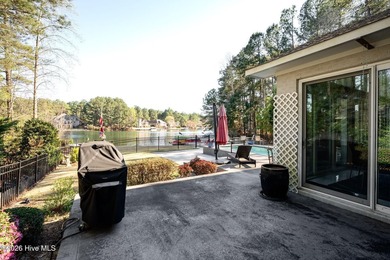 Welcome to this custom lakefront home on Lake Auman, where the - photo 49