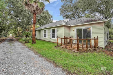 Investors or  owners - Hidden gem on Fort Morgan Road! Tucked - photo 1