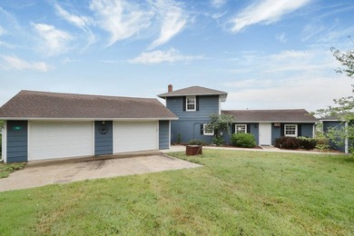 Phenomenal lake property with 180 degrees of water frontage and - photo 1