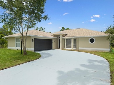 Stylishly renovated & move-in ready, this 3/2/2 CBS home is - photo 1