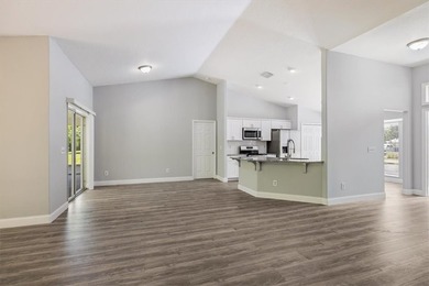 Stylishly renovated & move-in ready, this 3/2/2 CBS home is - photo 5