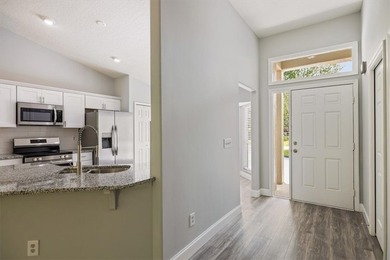 Stylishly renovated & move-in ready, this 3/2/2 CBS home is - photo 8
