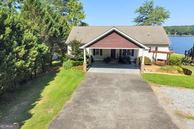 Experience lakefront living at its finest in the highly - photo 1