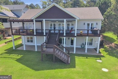 Experience lakefront living at its finest in the highly - photo 2