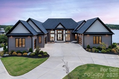 This architecturally stunning waterfront residence is a - photo 1