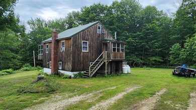 Privacy and seclusion await! This 2-bedroom, 1.5-bath home is - photo 2