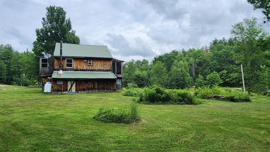 Privacy and seclusion await! This 2-bedroom, 1.5-bath home is - photo 3