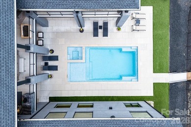 This architecturally stunning waterfront residence is a - photo 4