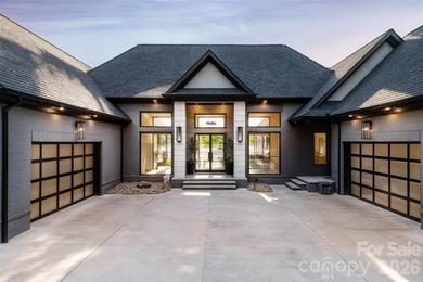 This architecturally stunning waterfront residence is a - photo 5