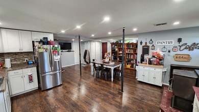 Privacy and seclusion await! This 2-bedroom, 1.5-bath home is - photo 5