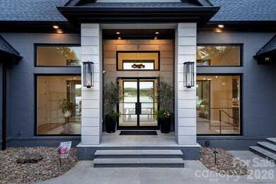 This architecturally stunning waterfront residence is a - photo 6