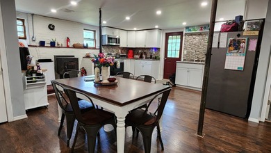 Privacy and seclusion await! This 2-bedroom, 1.5-bath home is - photo 6
