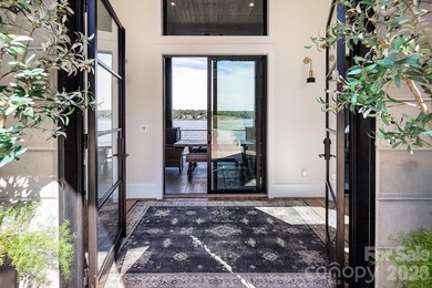 This architecturally stunning waterfront residence is a - photo 7
