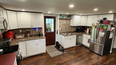 Privacy and seclusion await! This 2-bedroom, 1.5-bath home is - photo 7