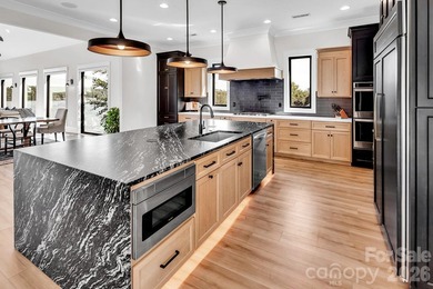 This architecturally stunning waterfront residence is a - photo 8