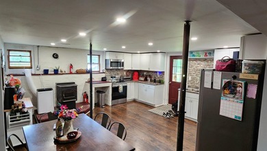 Privacy and seclusion await! This 2-bedroom, 1.5-bath home is - photo 8