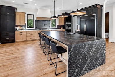 This architecturally stunning waterfront residence is a - photo 9