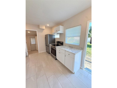 Welcome to this beautifully updated 3-bedroom, 2-bath home - photo 7
