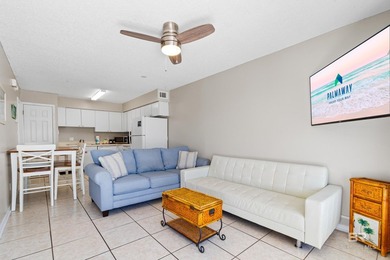 Step into easy coastal living at The Cove-a centrally located - photo 2