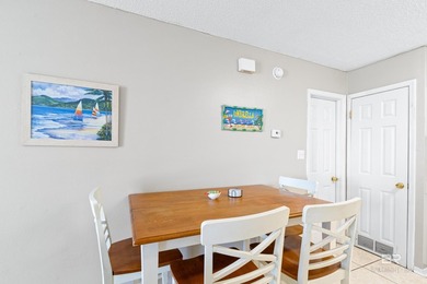 Step into easy coastal living at The Cove-a centrally located - photo 7