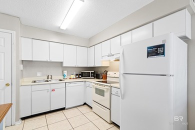 Step into easy coastal living at The Cove-a centrally located - photo 8