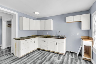 Unlock the potential of this 3-bedroom, 2-bathroom property - photo 12