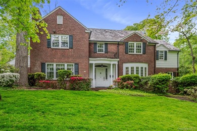Welcome to this stately and timeless brick Center Hall Colonial - photo 1