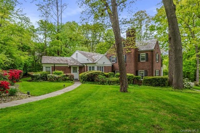 Welcome to this stately and timeless brick Center Hall Colonial - photo 2