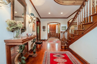 Welcome to this stately and timeless brick Center Hall Colonial - photo 5