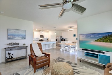 This exquisite 4-bedroom model in highly sought-after gated - photo 3