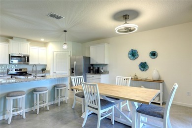 This exquisite 4-bedroom model in highly sought-after gated - photo 8