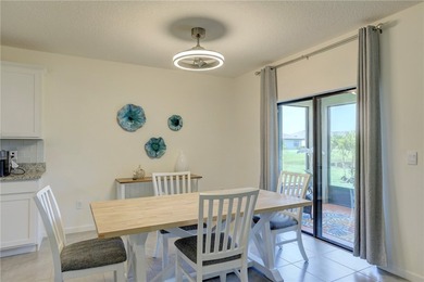 This exquisite 4-bedroom model in highly sought-after gated - photo 9