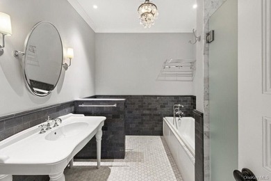 A renovated two-family townhouse nestled less than two blocks - photo 8