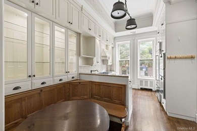A renovated two-family townhouse nestled less than two blocks - photo 10