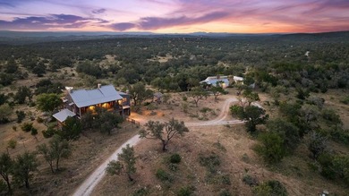At the heart of the ranch lies a custom two-story home, built in - photo 2