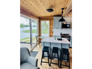 Experience exceptional lake living with 240 feet of prime - photo 12
