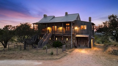 At the heart of the ranch lies a custom two-story home, built in - photo 3