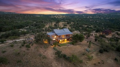 At the heart of the ranch lies a custom two-story home, built in - photo 4