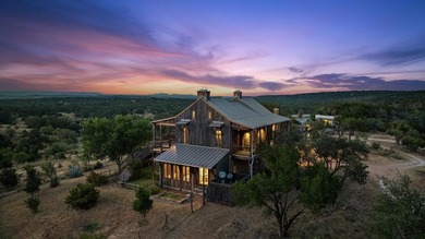 At the heart of the ranch lies a custom two-story home, built in - photo 6