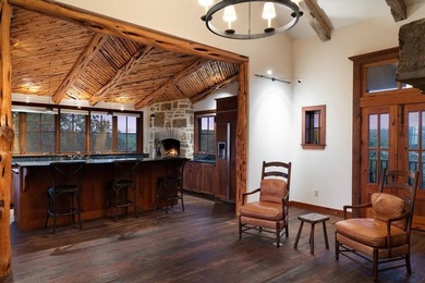 At the heart of the ranch lies a custom two-story home, built in - photo 9