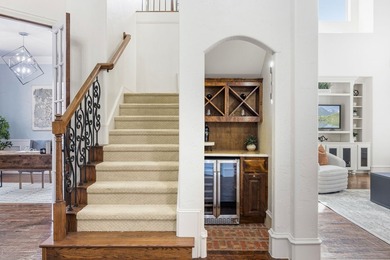 Nestled within the prestigious, guard-gated Villas of Hogan's - photo 3