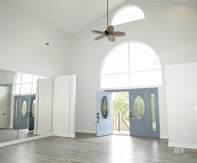Experience coastal luxury on gated Ono Island. This stunning 3 - photo 6